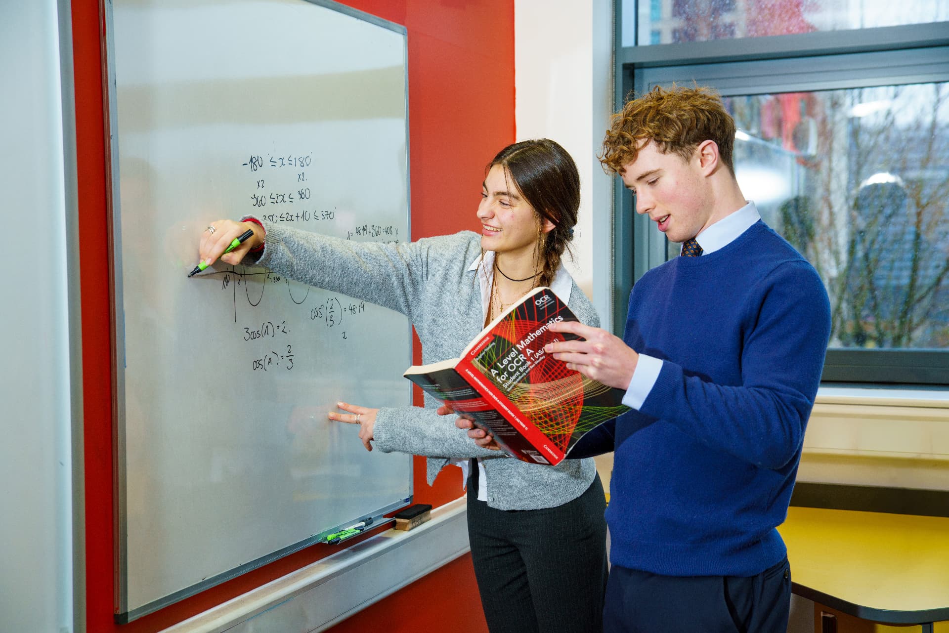 Sixth Form students working together on an A Level Mathematics problem